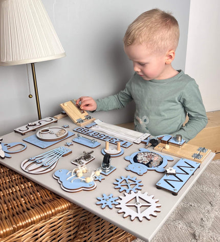 Montessori busy board with doors and locks (40×60 cm)