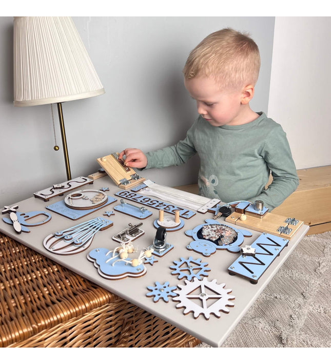 Montessori busy board with doors and locks (40×60 cm)